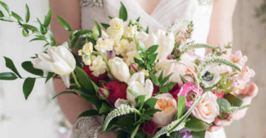pink and white flowers in a wedding bouquet