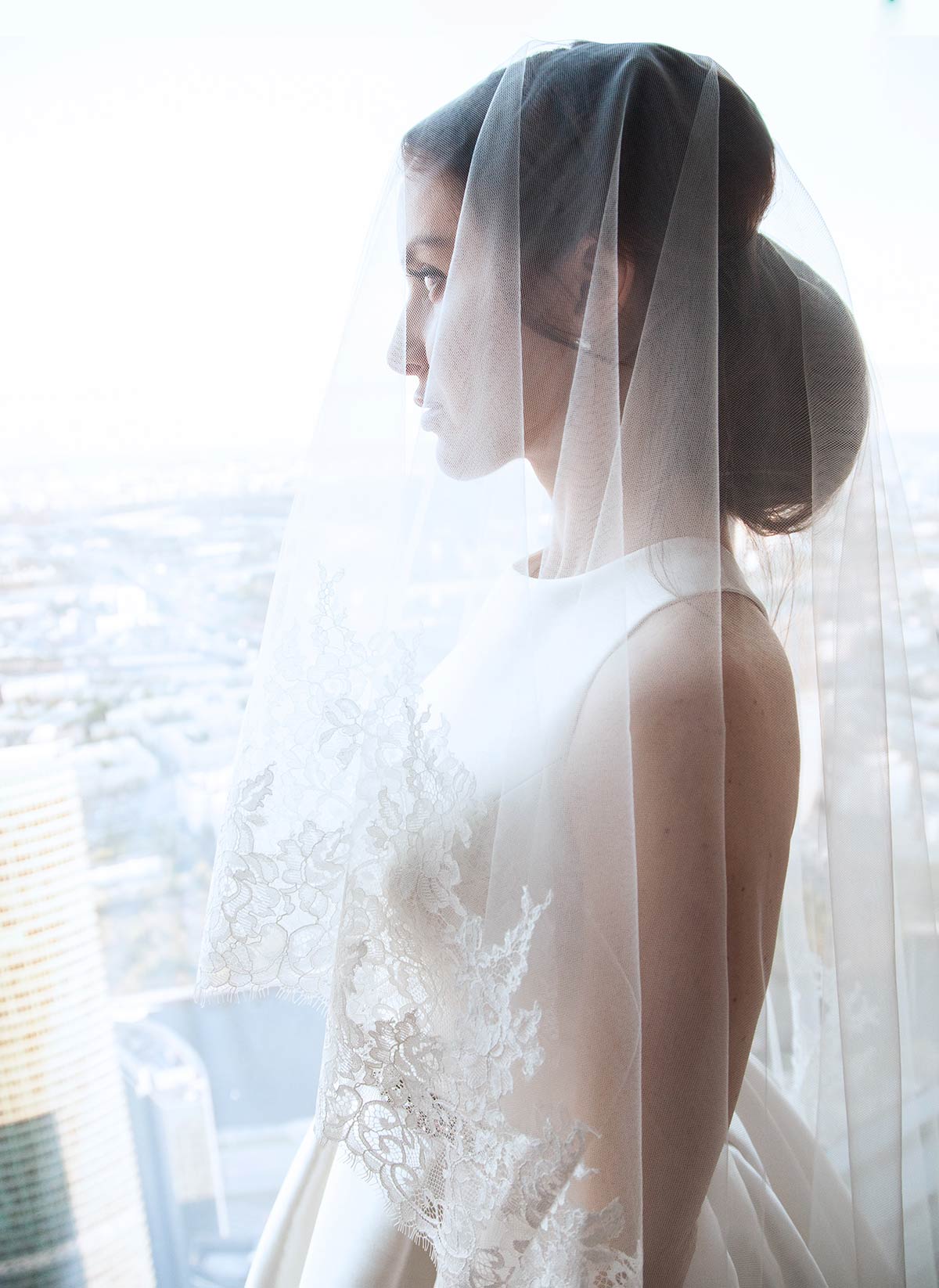 BRIDE-WEARING-A-VEIL bride with a veil