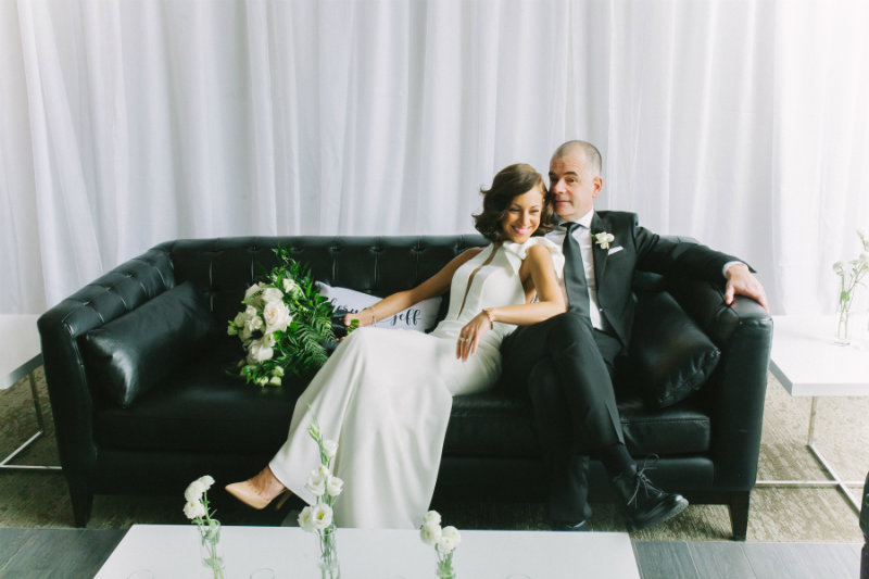 rosetta li photography8 couple sitting on a black couch