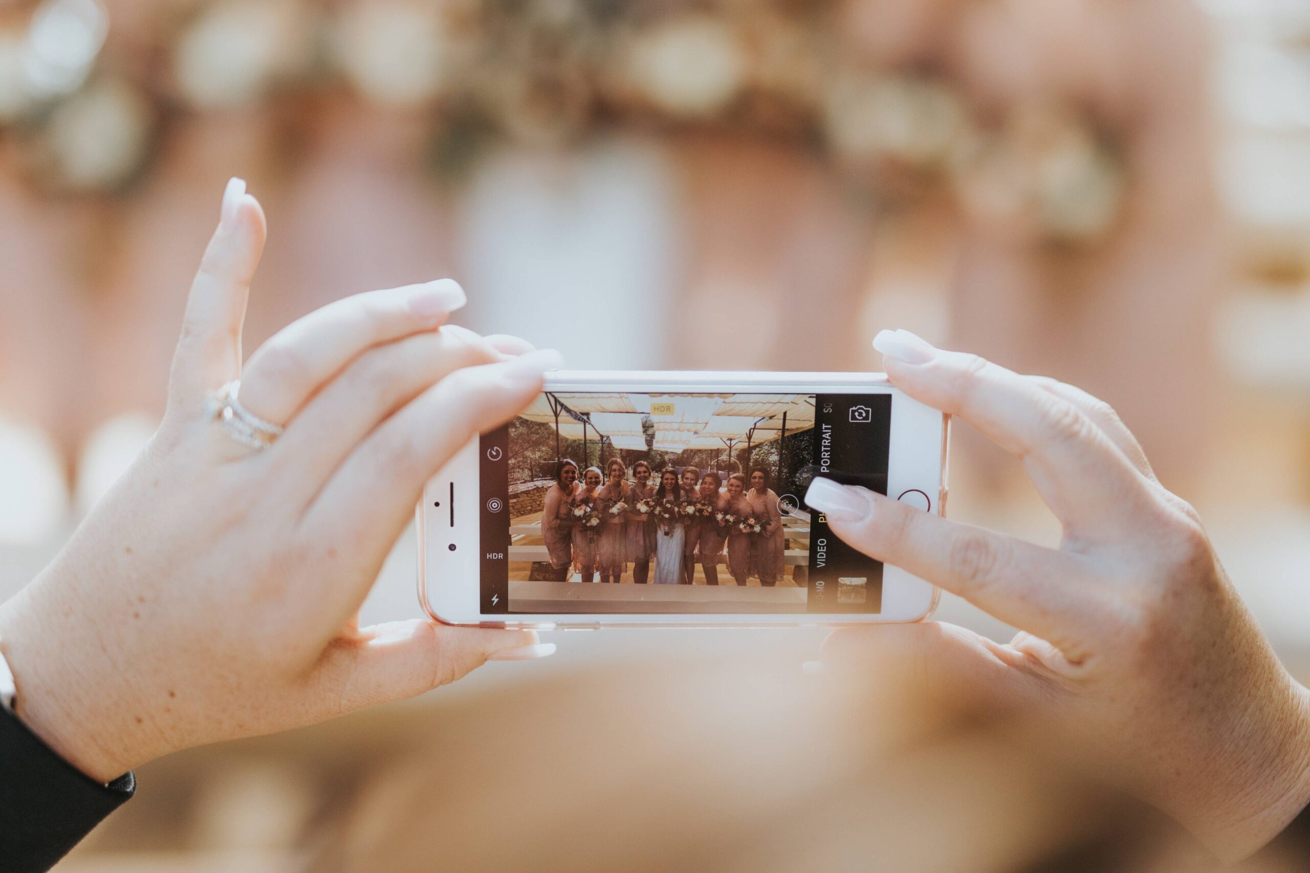 nathan-dumlao-x-xiZ44YcFI-unsplash friends taking wedding photos