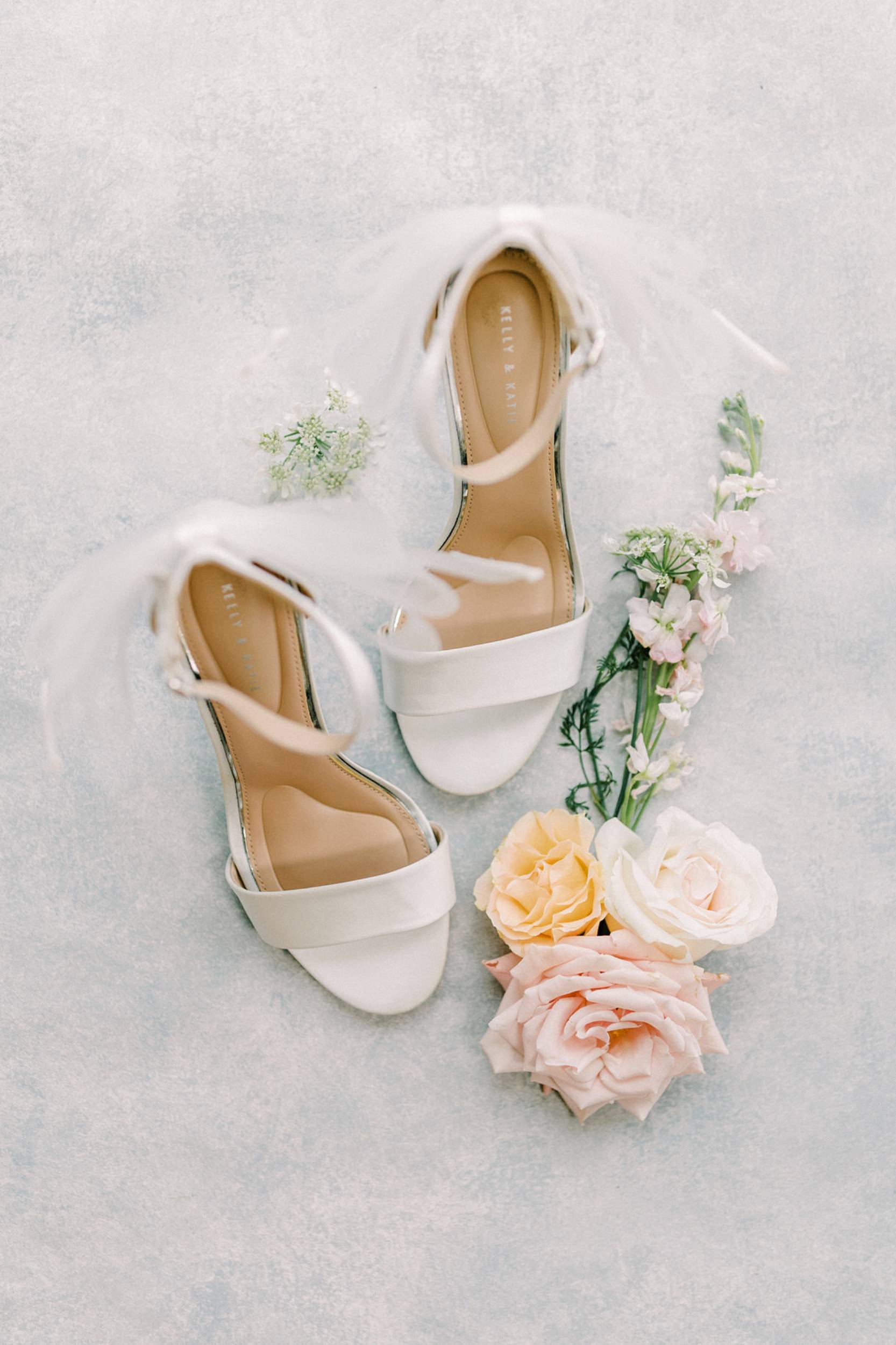 Altice_Blackwell_Megan Lampert Photography_Megan Lampert Photography, LLC Kaitlin and Key Wedding 20243_low white wedding shoes