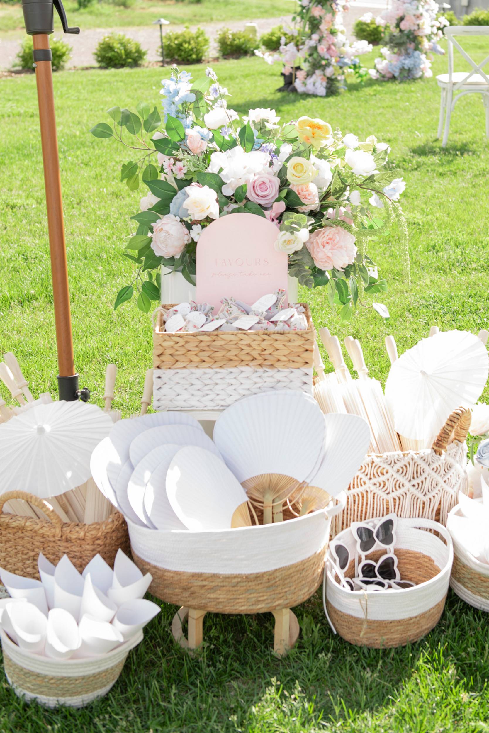 Flower wedding at the winery_Anna Krasovska_DSC_3536_1_low wedding ceremony fans and sunglasses