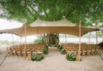 tropical wedding tent ceremony by the beach