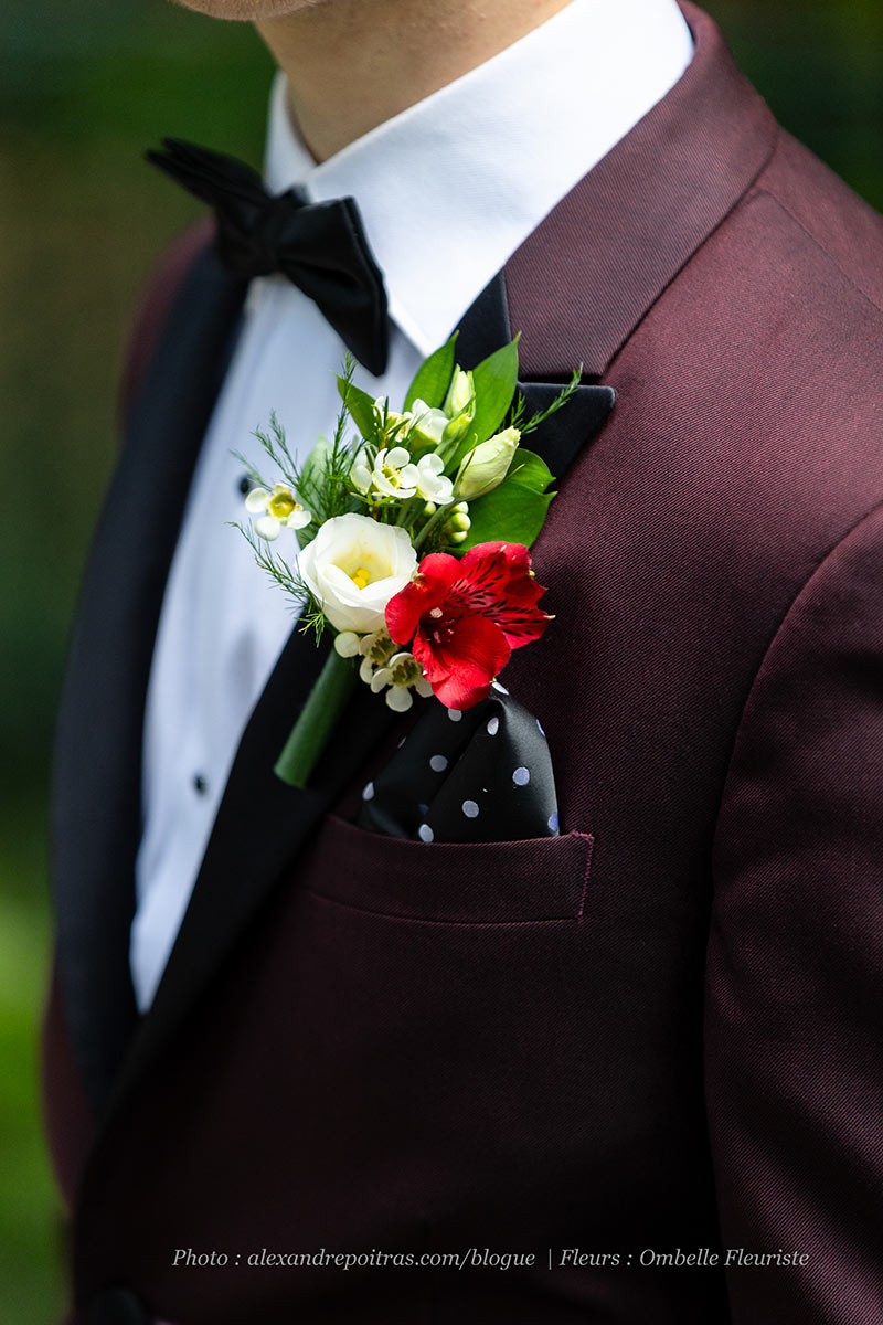 Mariage-romantique-rouge-boutonniere-marie-copyright